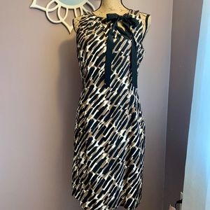 Classy Sleeveless Silk Dress with Front side Bow Sz 8
